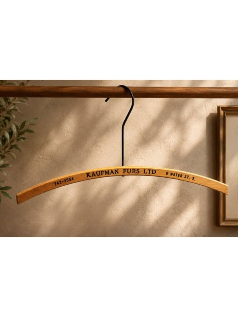 Kaufman Furs Ltd. Wooden Hanger
